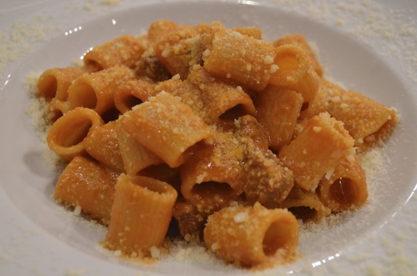 Amatriciana: Bucatini with tomato sauce, guanciale (cured pork cheek), pecorino cheese