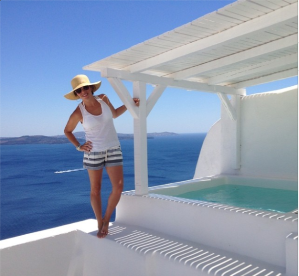 Hanging out on the ledge of our terrace at Canaves Oia Hotel